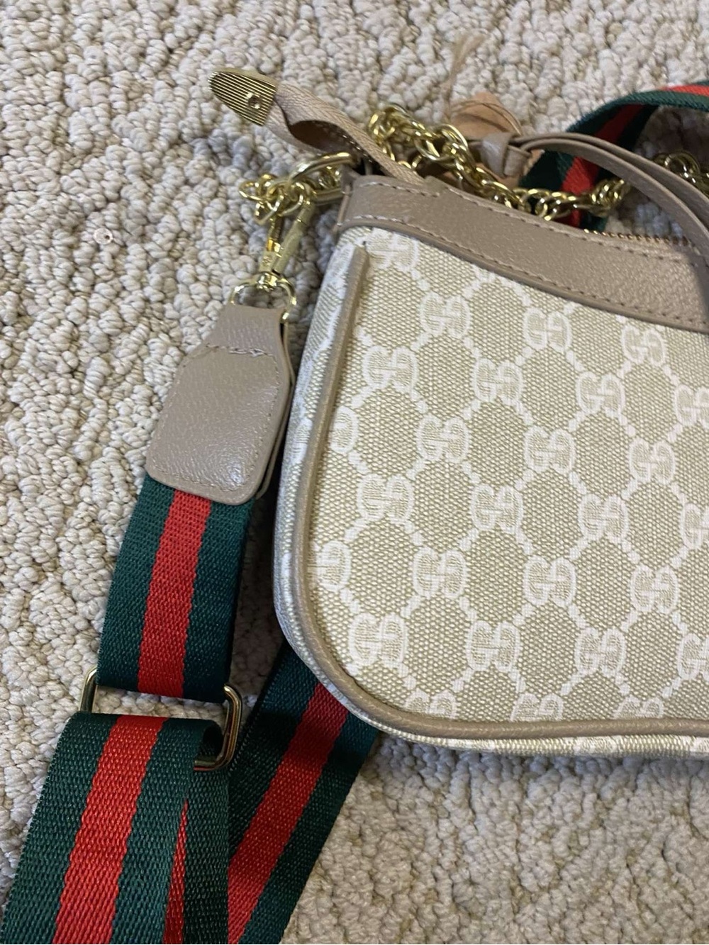 Beige monogram purse with red and green strap